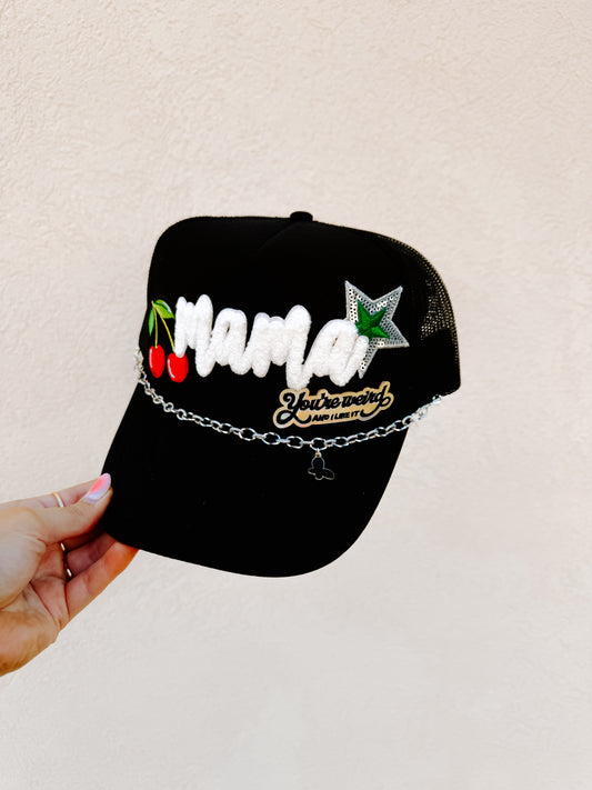 MAMA “You’re Weird and I like it” Trucker Hat
